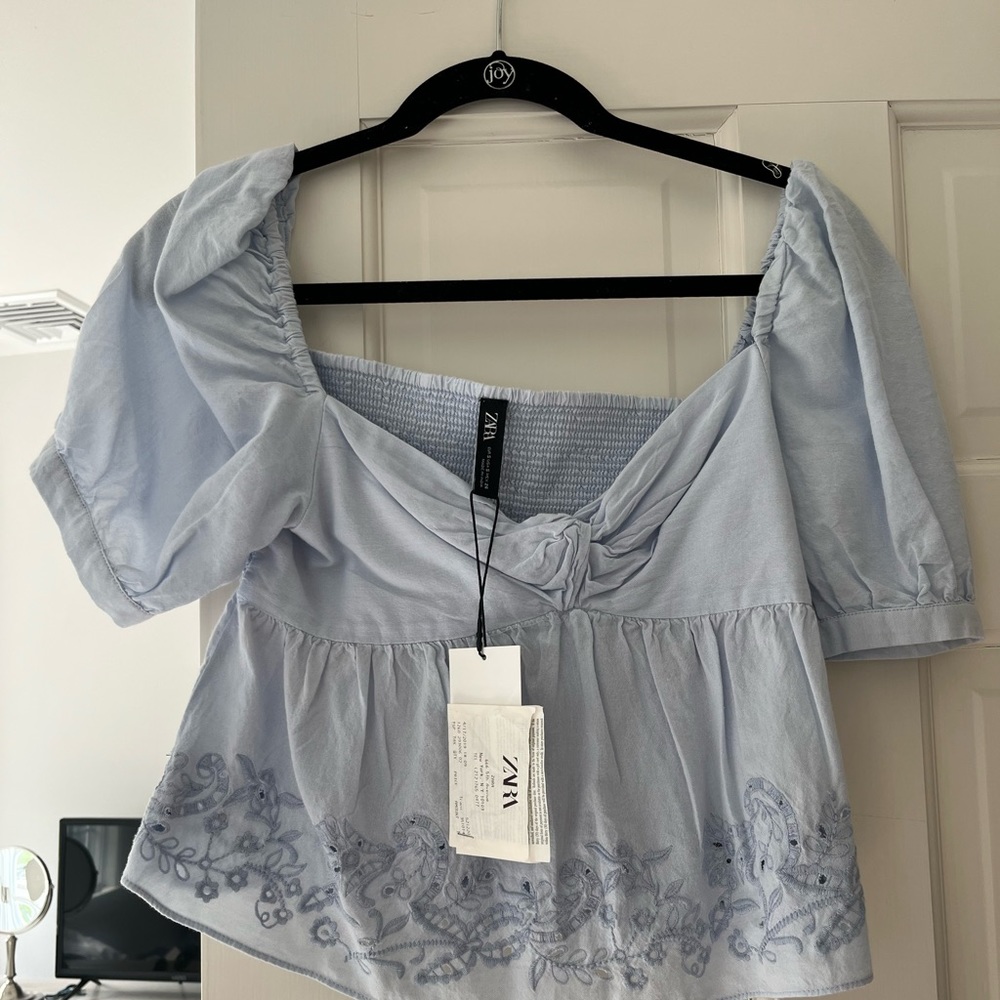 Blue Top perfect for summer with shorts or jeans.